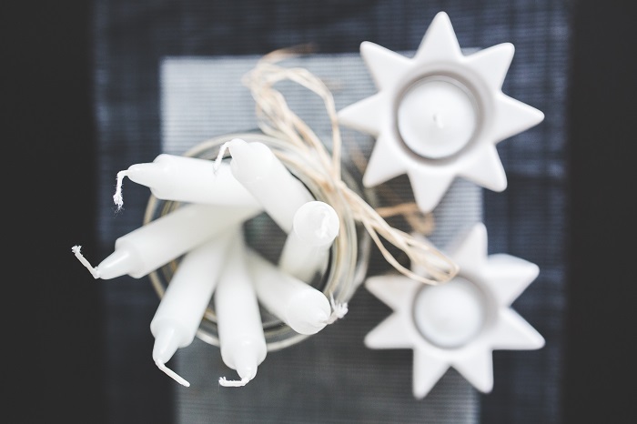 photo; white holiday decorations and candles